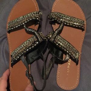 Black and gold flat sandals